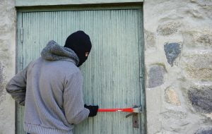 Burglar Breaking Into a Property